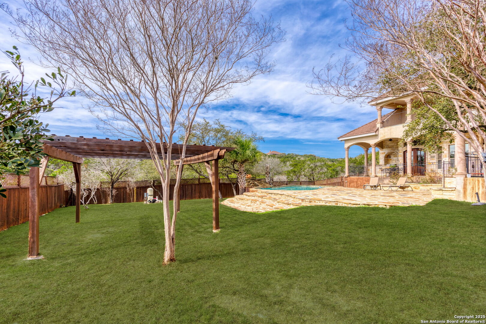192 County Road 2812 Mico, TX 78056 - Photo 37 of 47 a view of a house with a yard