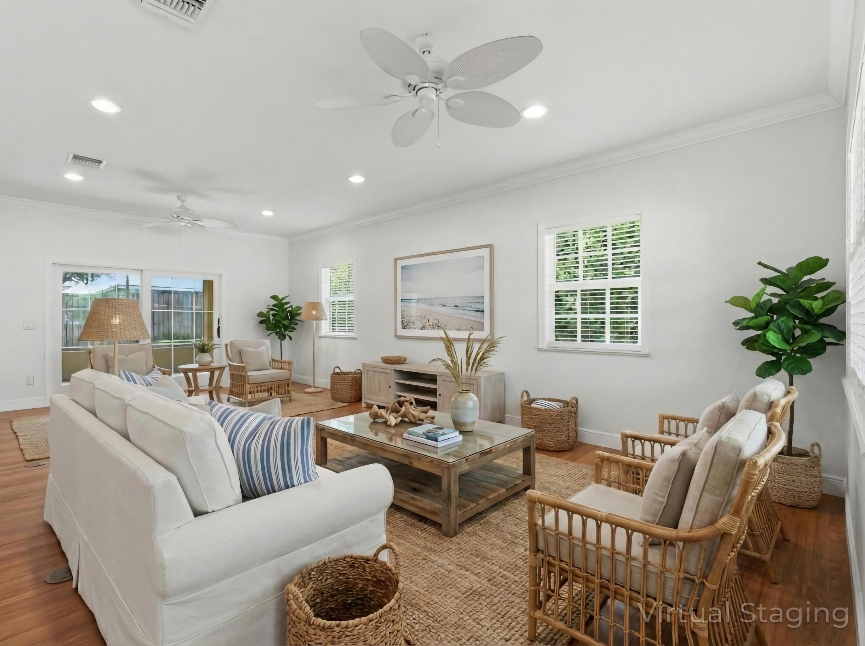 9322 Southeast Athena Street Hobe Sound, FL 33455 - Photo 11 of 68 a living room with furniture and a large window