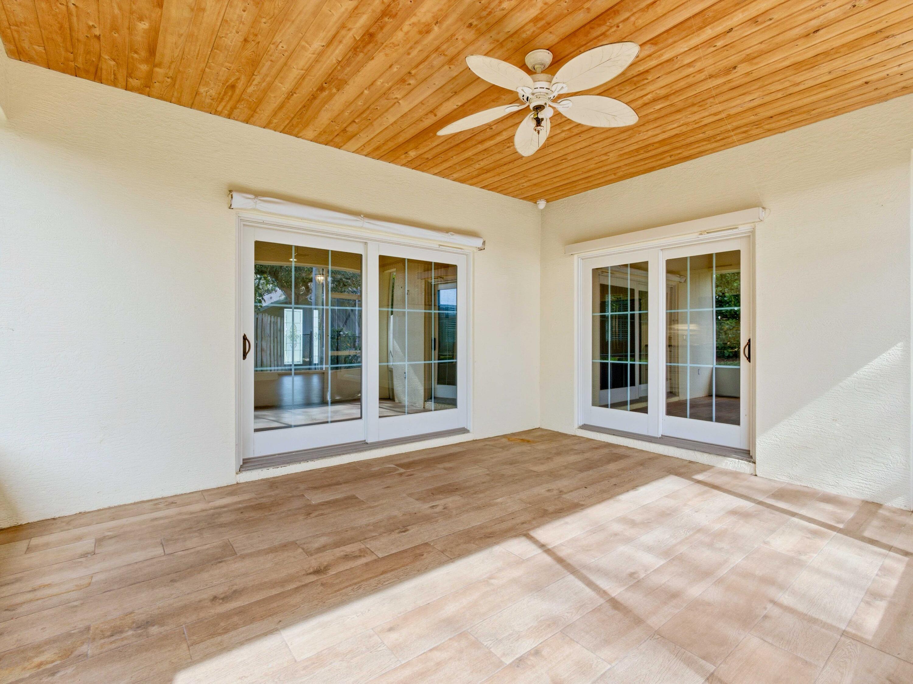 9322 Southeast Athena Street Hobe Sound, FL 33455 - Photo 30 of 68 a view of an entrance of the house