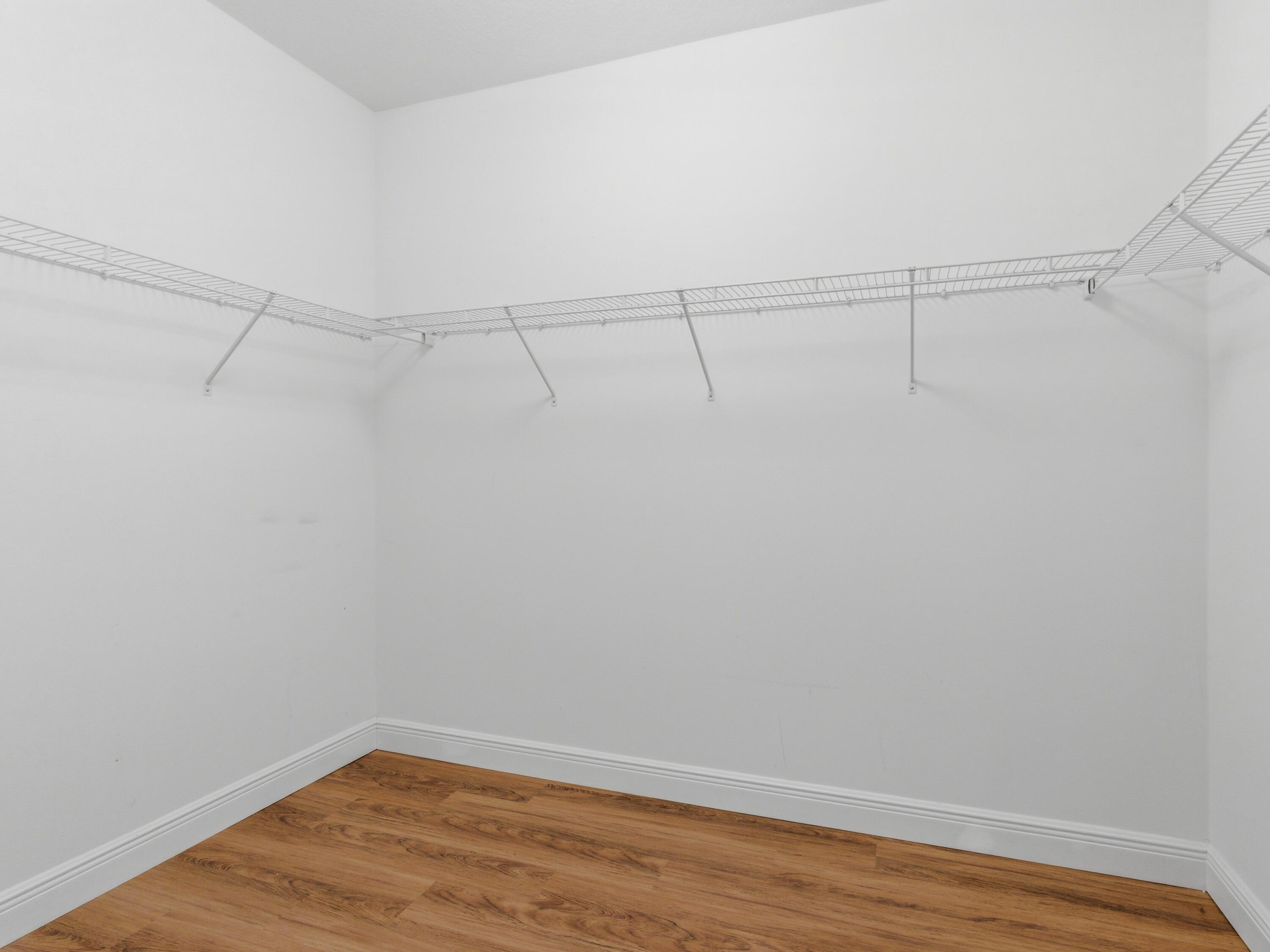 9322 Southeast Athena Street Hobe Sound, FL 33455 - Photo 34 of 68 a view of a room with empty racks