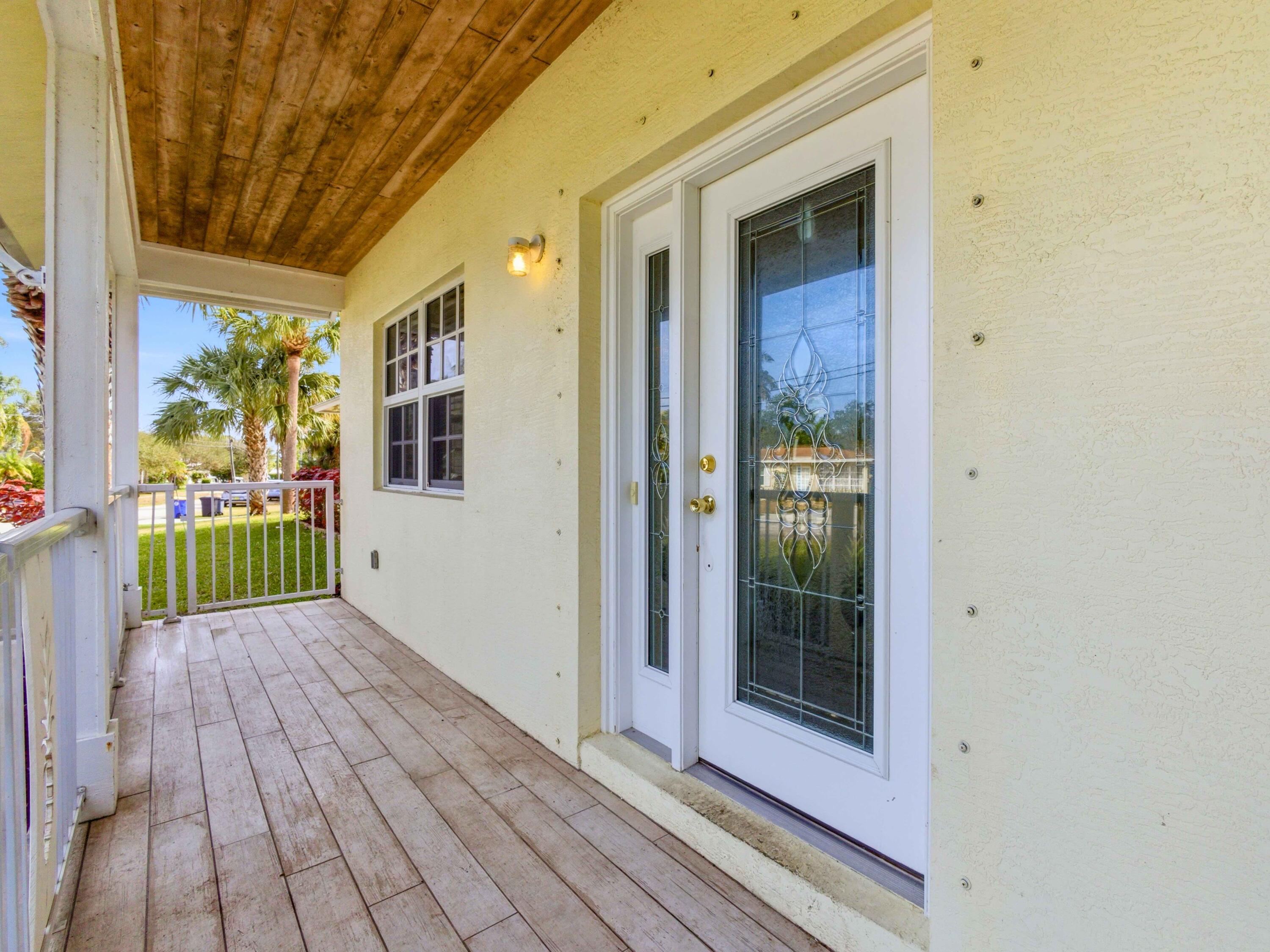 9322 Southeast Athena Street Hobe Sound, FL 33455 - Photo 8 of 68 Front Door