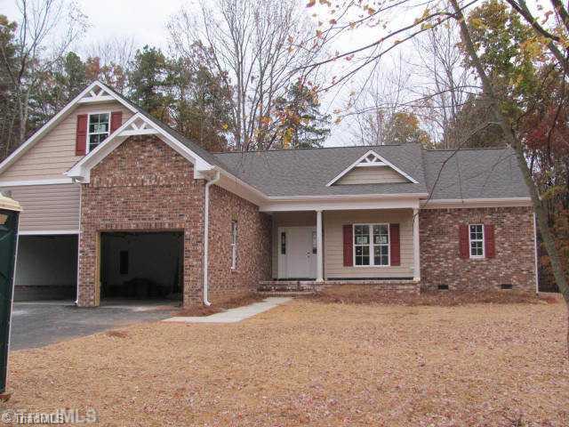 1086 Tuttle Road Rural Hall, NC 27045 - Photo 11 of 11 Exterior Front. 2012 PARADE OF HOMES. BUY TODAY AND MOVE IN FOR THE HOLIDAYS. OPEN FLOOR PLAN. LUXURY MASTER SUITE, COVERED BACK PORCH, GRANITE, TILE, HARDWOOD FLOORS, ARCHITECTUAL ROOF. LEVEL LOT. PARTIAL FINISHED BONUS ROOM. HUGE MUD/LAUNDRY RM