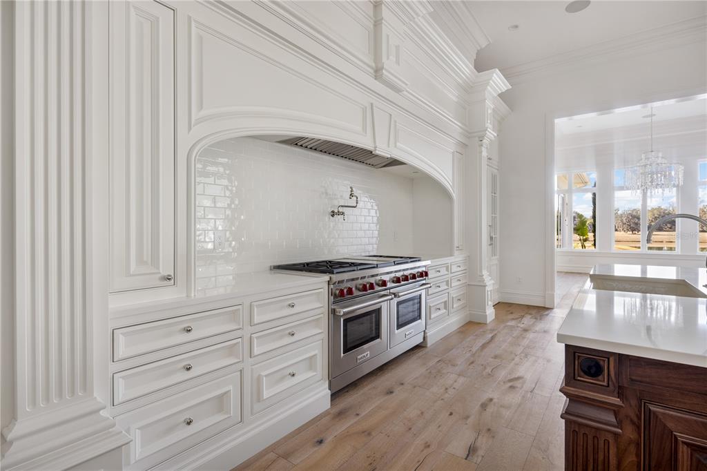 8570 Northwest 31st Lane Road Ocala, FL 34482 - Photo 20 of 53 a kitchen with granite countertop white cabinets and white appliances