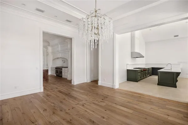 a kitchen with stainless steel appliances a stove and a refrigerator