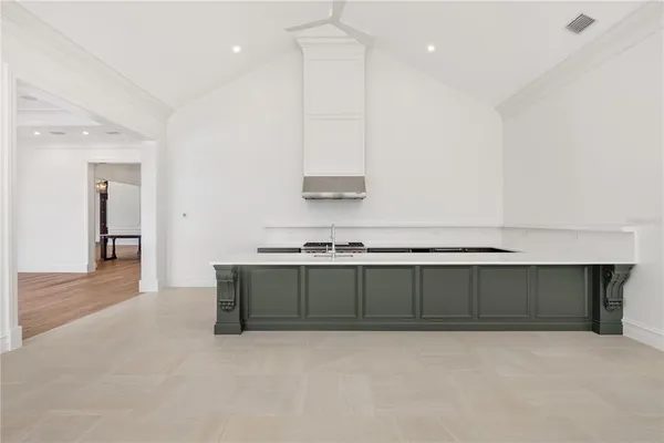 a view of an empty room with glass door