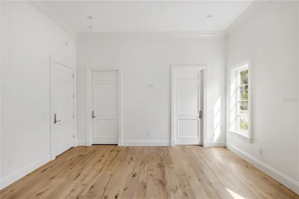a spacious bathroom with a bathtub and next to a window