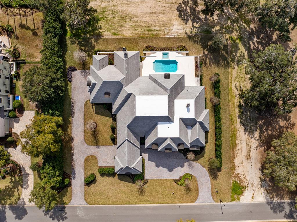 8570 Northwest 31st Lane Road Ocala, FL 34482 - Photo 8 of 53 an aerial view of residential houses with outdoor space
