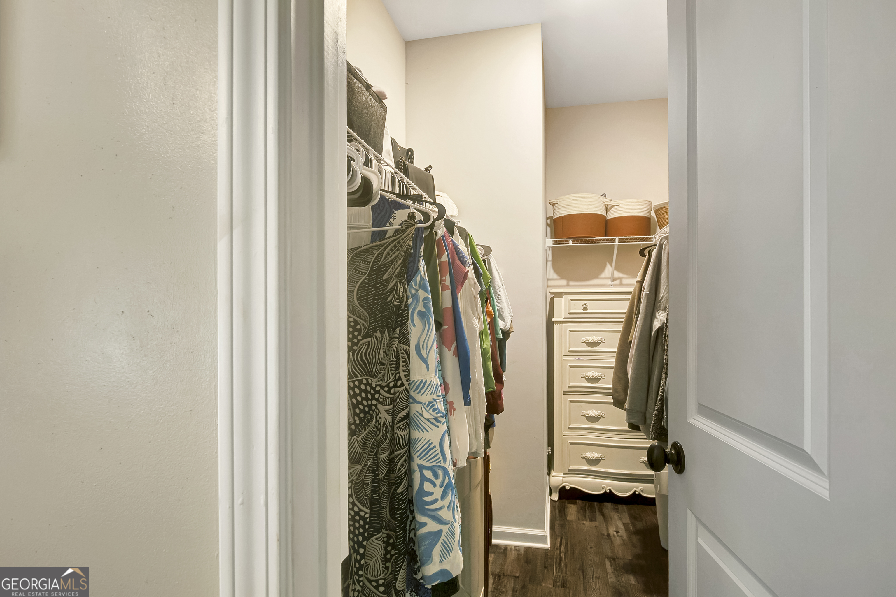 149 Raymond Carson Street Newnan, GA 30263 - Photo 23 of 42 Primary Bedroom - Contains two walk in Closets - One on each side of bedroom.