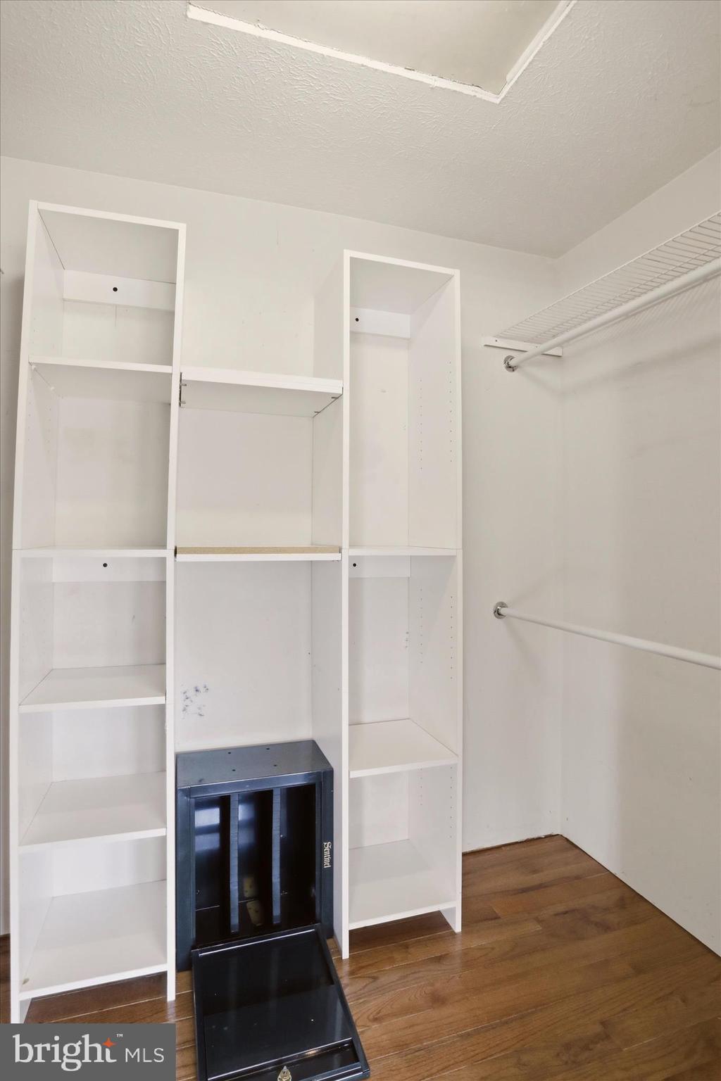 13605 McKenzie Tower Road Southwest Cumberland, MD 21502 - Photo 25 of 63 a room with walk in closet and wooden floor