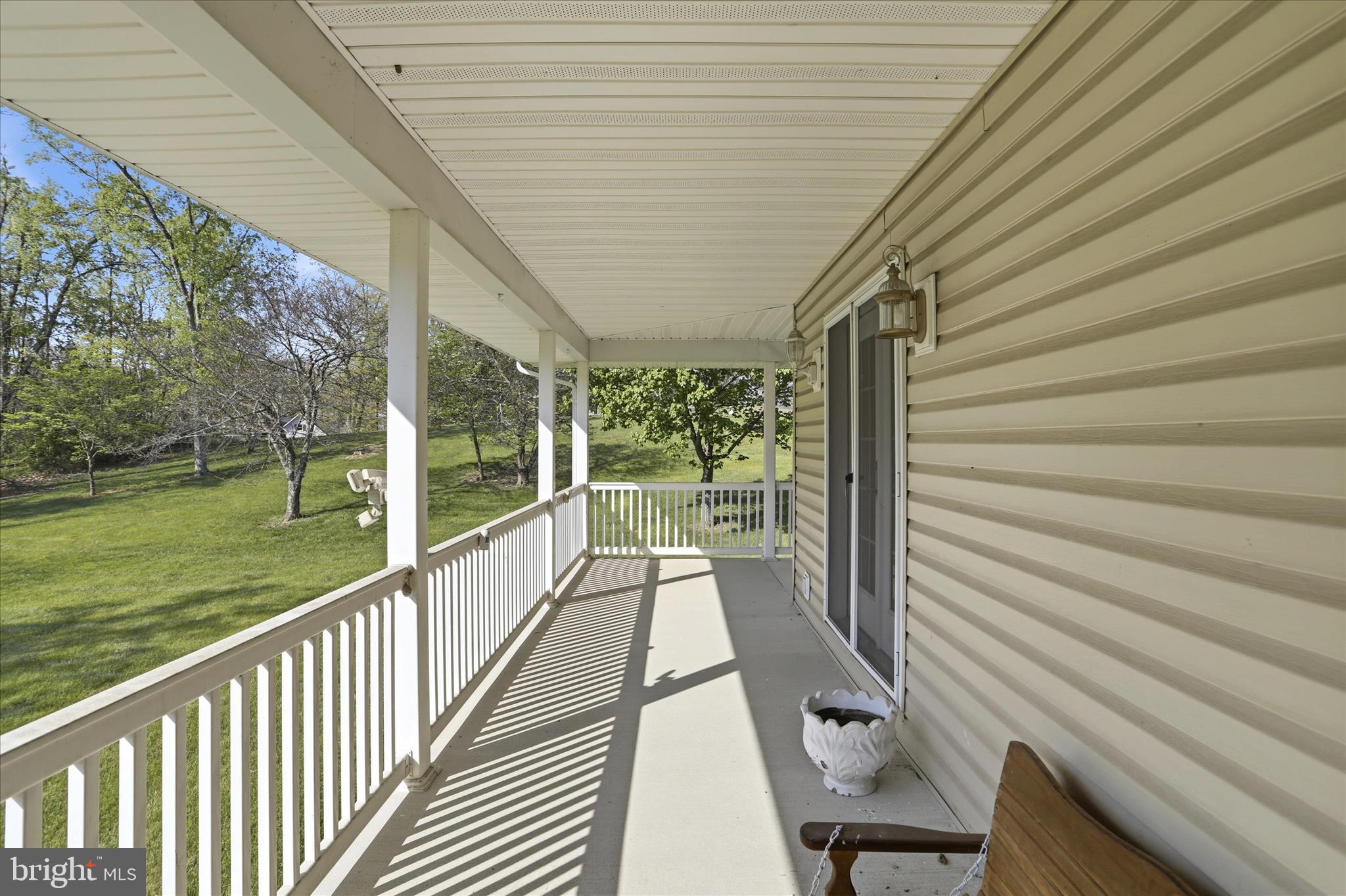 13605 McKenzie Tower Road Southwest Cumberland, MD 21502 - Photo 49 of 63 a view of a porch with wooden floor and outdoor space