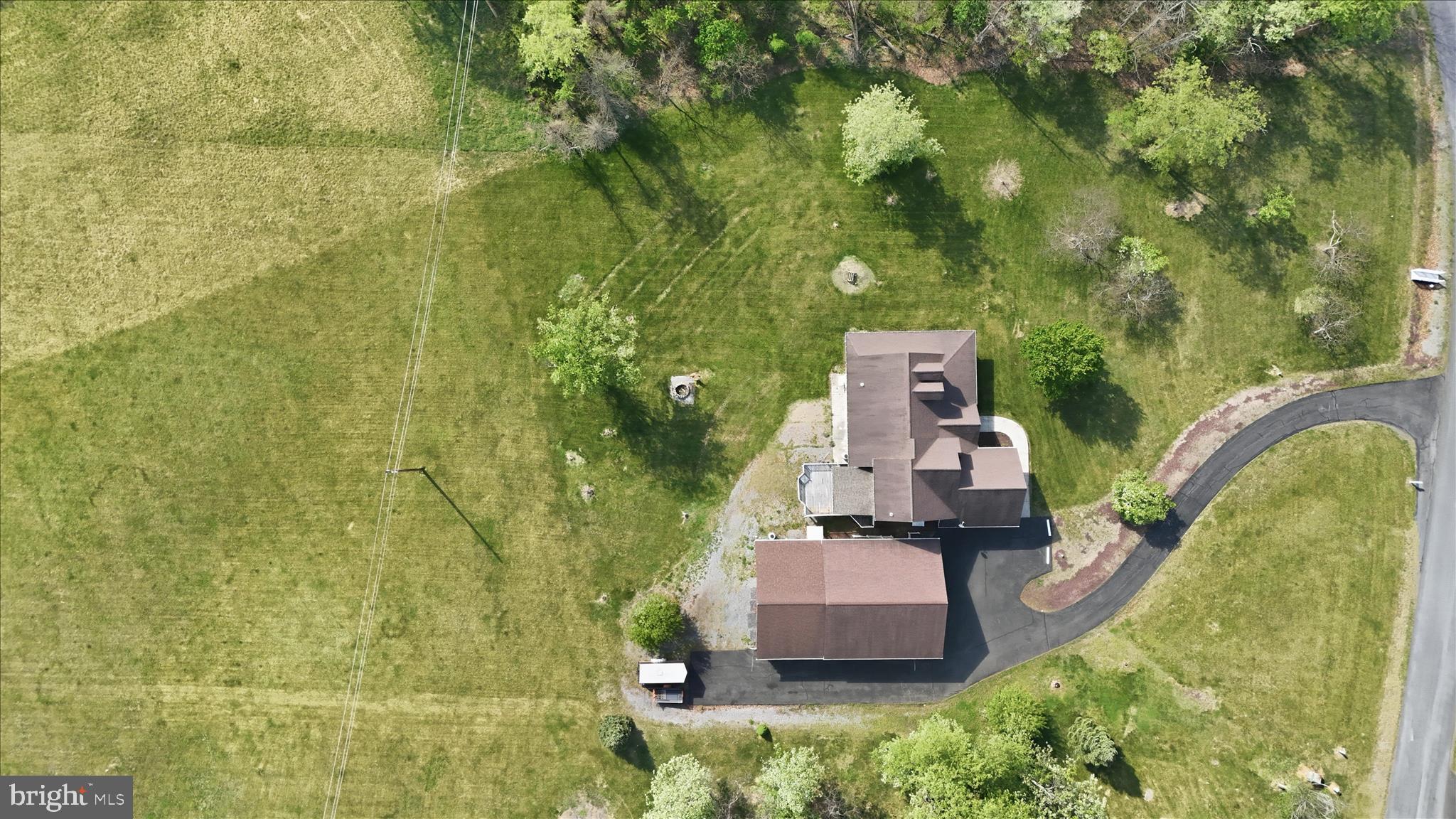 13605 McKenzie Tower Road Southwest Cumberland, MD 21502 - Photo 60 of 63 an aerial view of a house with a garden
