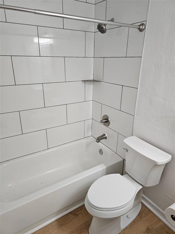 1023 South Hiawassee Road, Unit 4013 Orlando, FL 32835 - Photo 8 of 10 a bathroom with a toilet and a shower