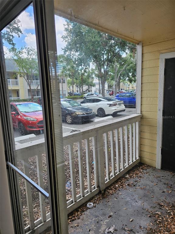 1023 South Hiawassee Road, Unit 4013 Orlando, FL 32835 - Photo 9 of 10 a city view from a balcony