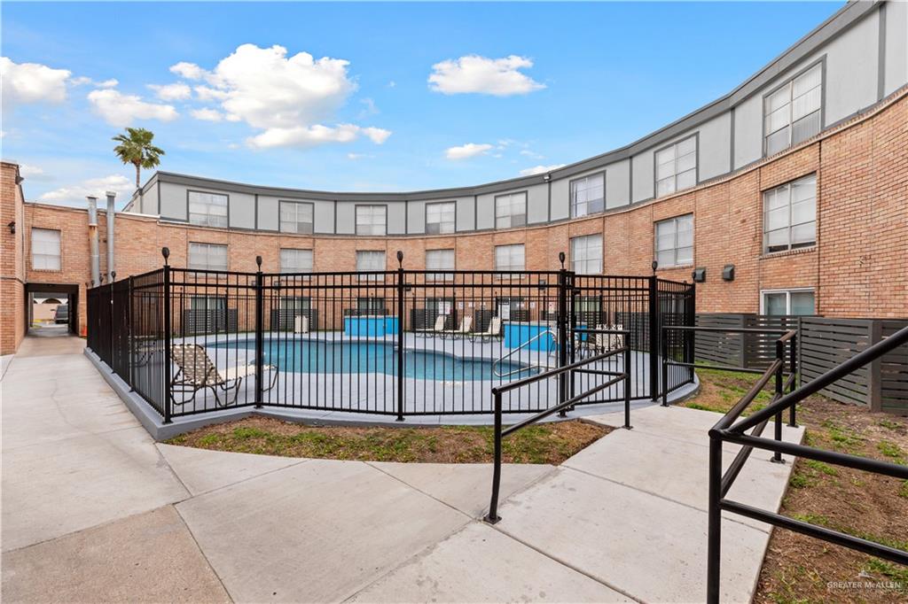 2425 Barnard Road, Unit A13 Brownsville, TX 78520 - Photo 15 of 15 a view of staircase with a swimming pool