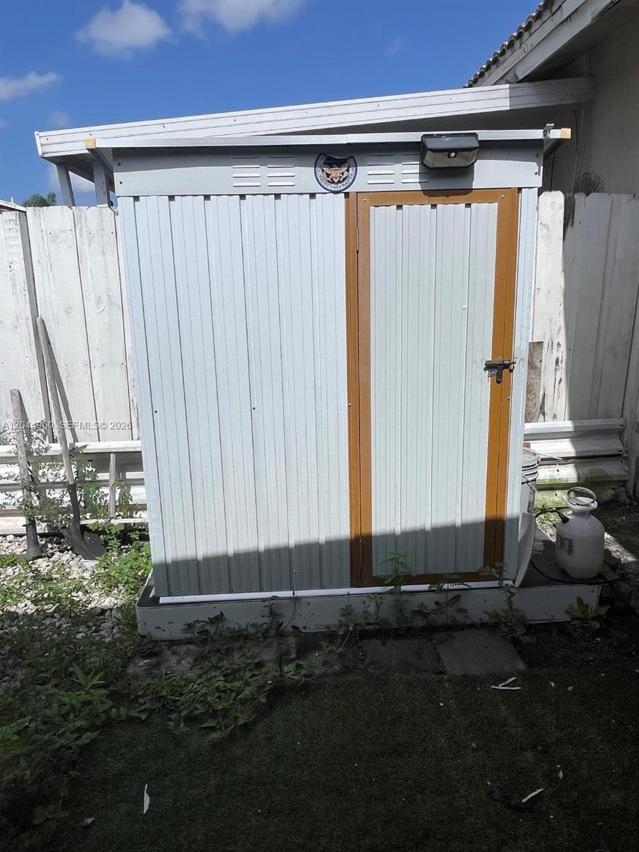 7681 Northwest 178th Terrace Hialeah, FL 33015 - Photo 10 of 11 a view of a storage room