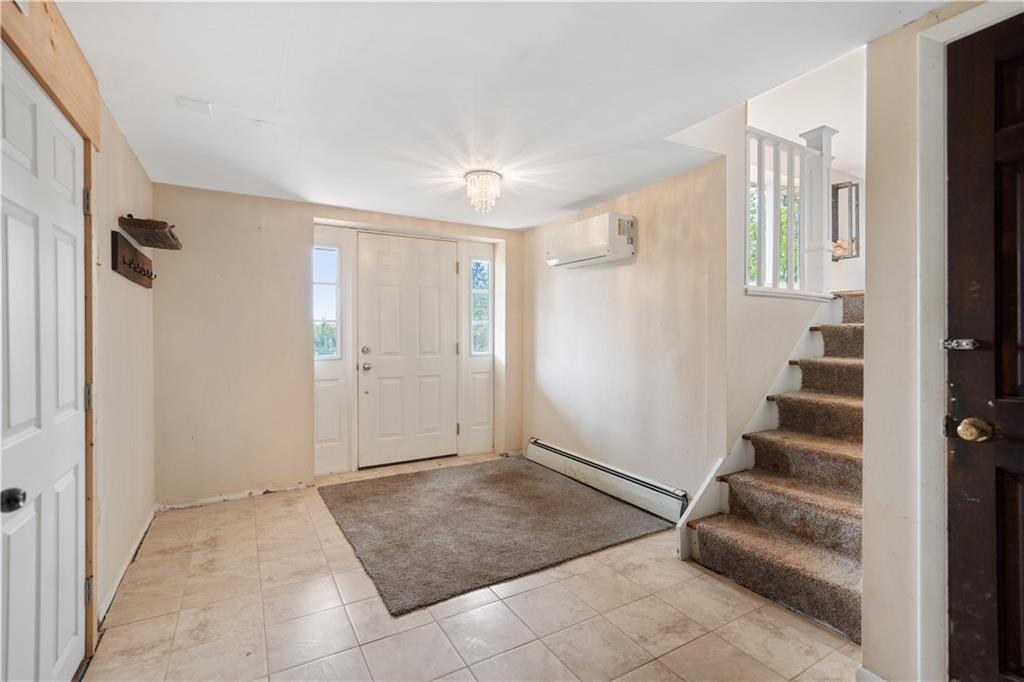 348 McCleary Road Hookstown, PA 15050 - Photo 3 of 41 a view of entryway with stairs and a livingroom view