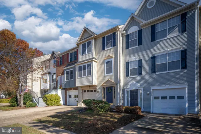 a front view of a building with street view