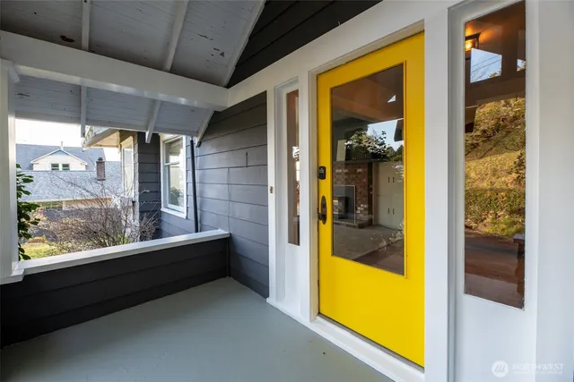 a view of walk in closet with wooden floor
