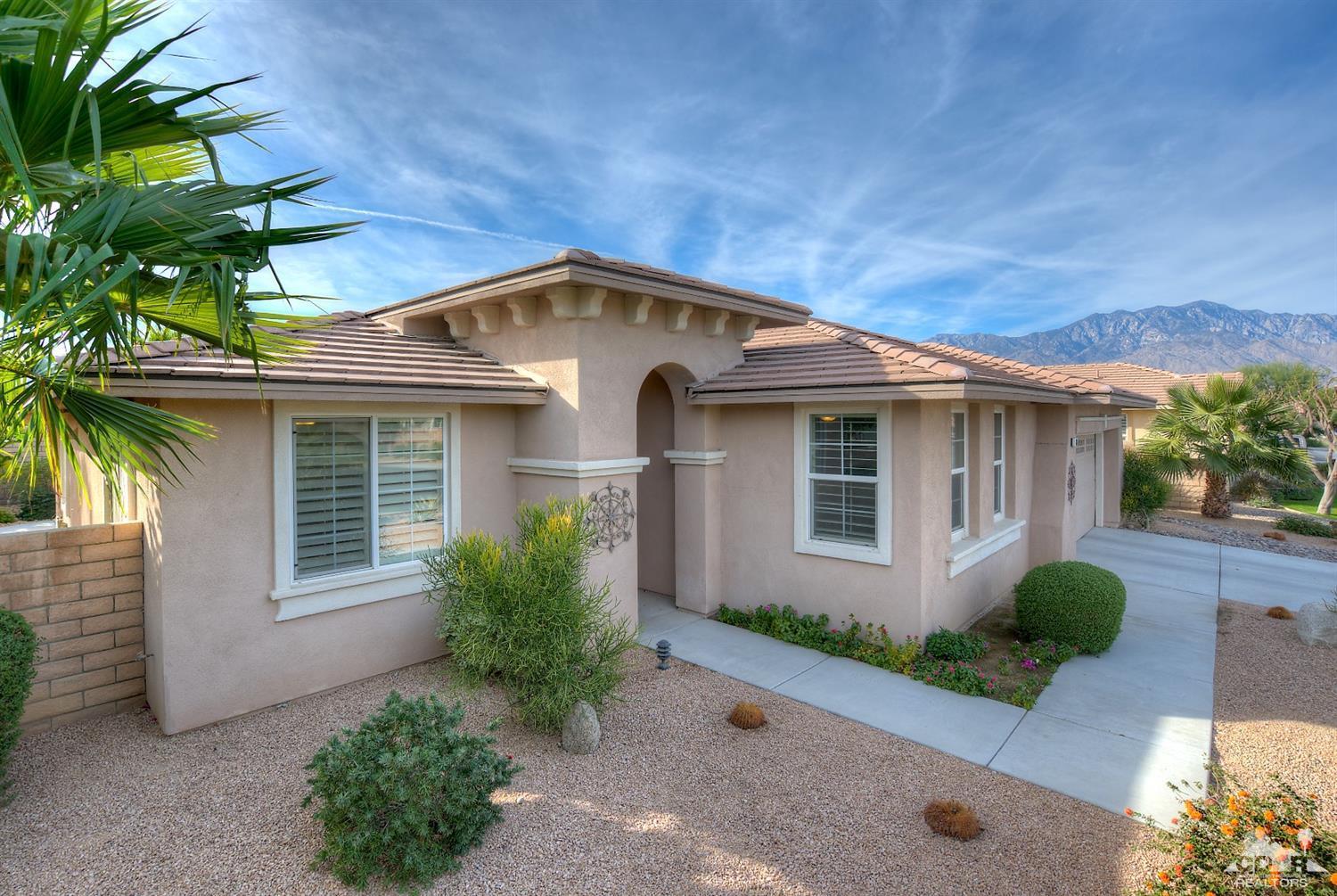 186 Via Milano Rancho Mirage, CA 92270 - Photo 2 of 24 a front view of a house with garden
