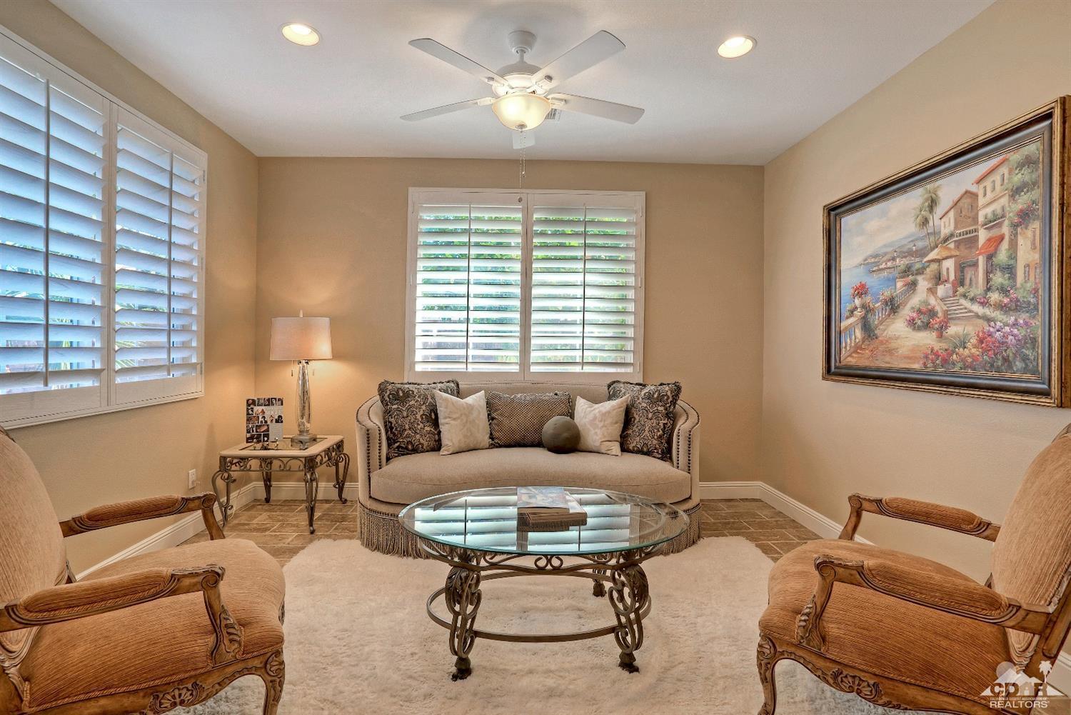 186 Via Milano Rancho Mirage, CA 92270 - Photo 4 of 24 a living room with furniture and a window