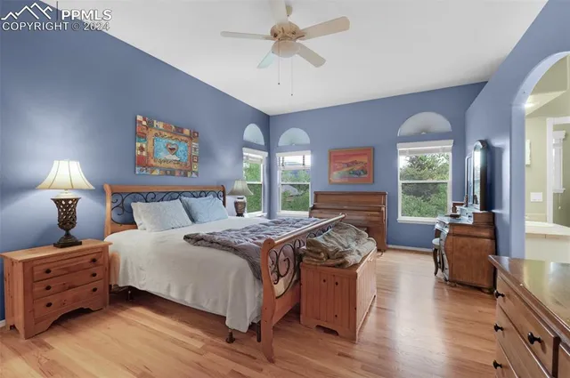 a room with a refrigerator and a sink