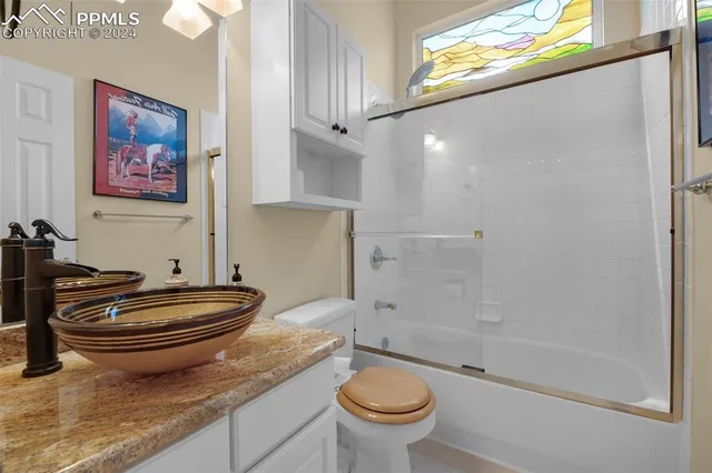 a view of room with toys and wooden floor