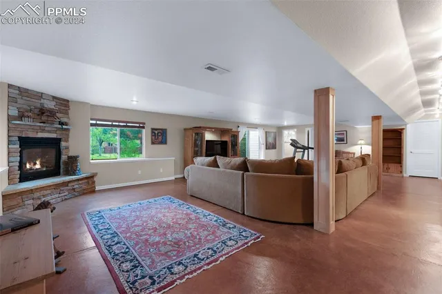 a living room with furniture and a couch