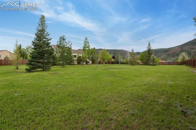 a view of a house with a park