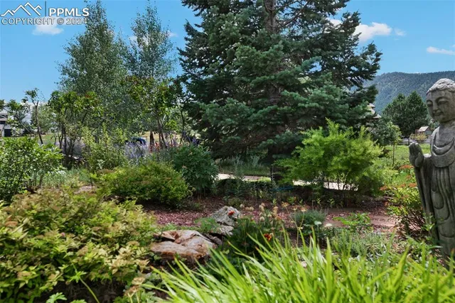 a kitchen with a sink microwave and refrigerator