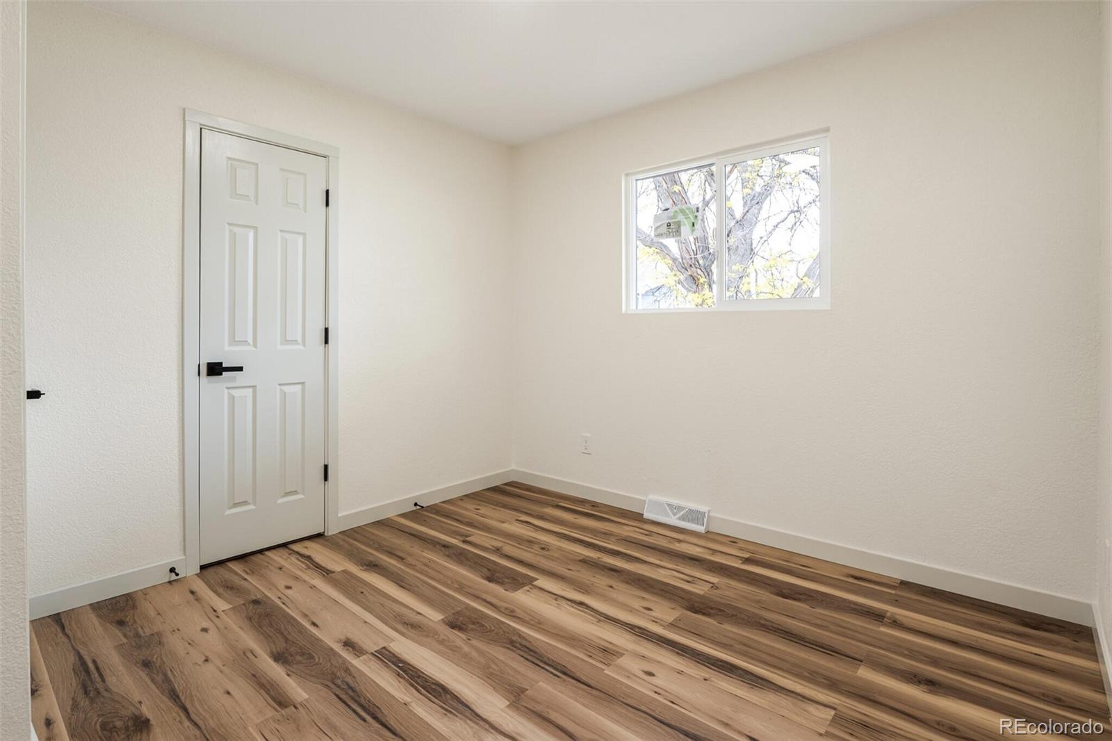 2040 Mable Avenue Denver, CO 80229 - Photo 11 of 25 a view of a room that has a window in it