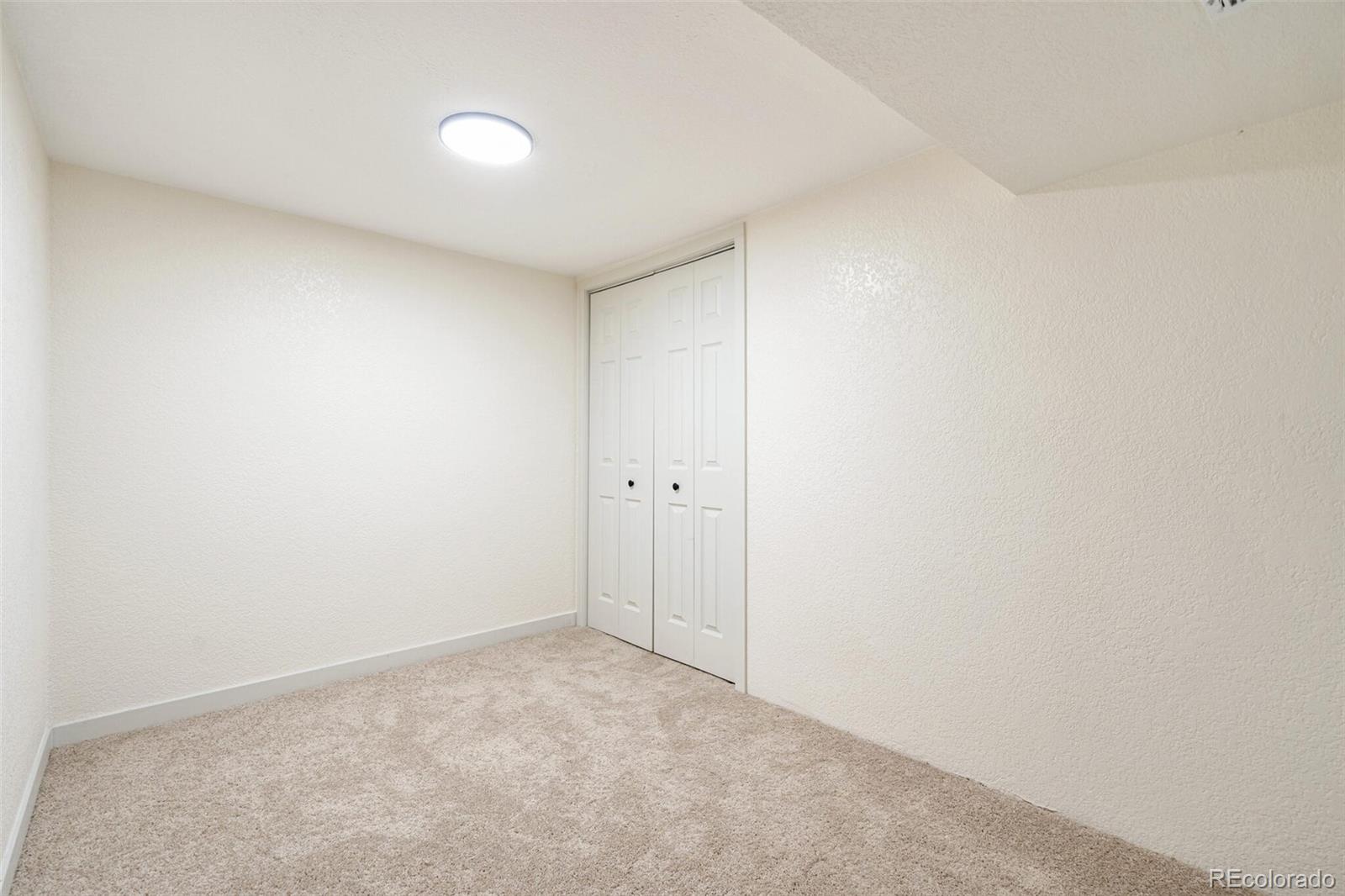 2040 Mable Avenue Denver, CO 80229 - Photo 18 of 25 a view of an empty room