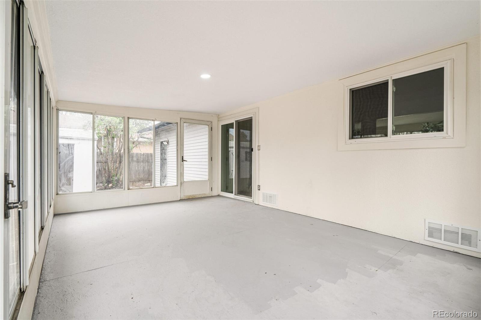 2040 Mable Avenue Denver, CO 80229 - Photo 20 of 25 a view of an empty room with a window
