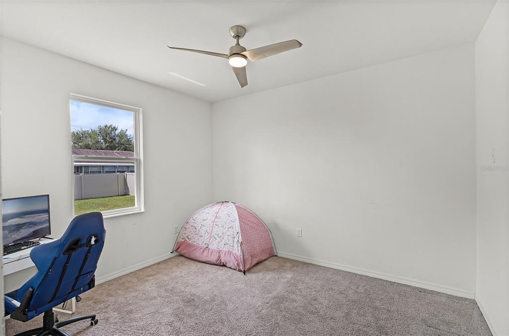 804 Channing Street Winter Haven, FL 33880 - Photo 25 of 31 a workspace with furniture and window