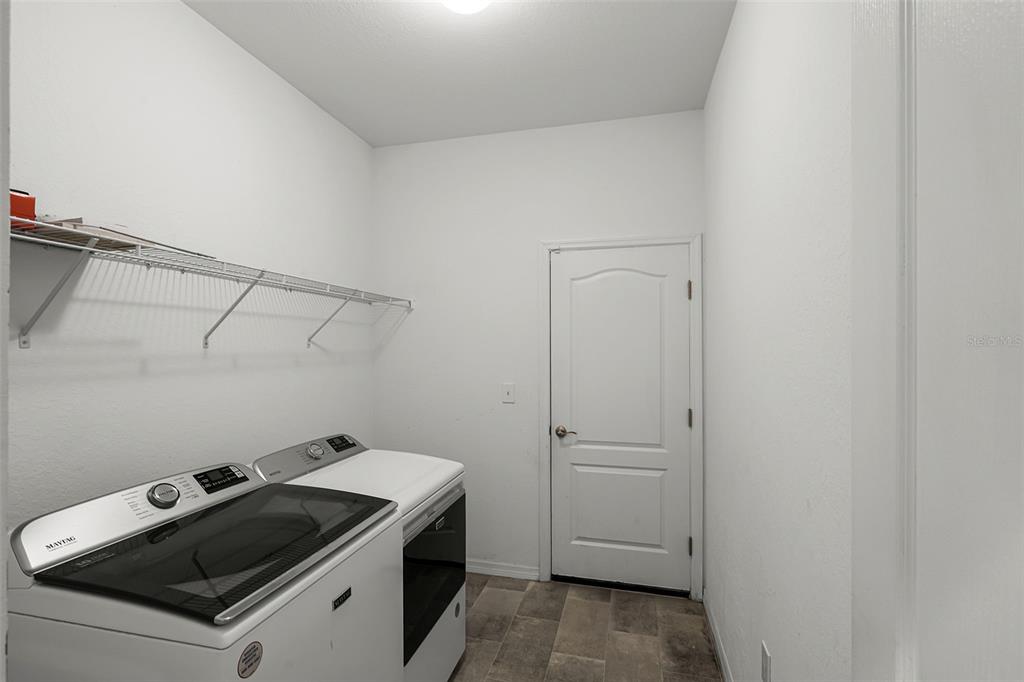 804 Channing Street Winter Haven, FL 33880 - Photo 27 of 31 a utility room with dryer and washer