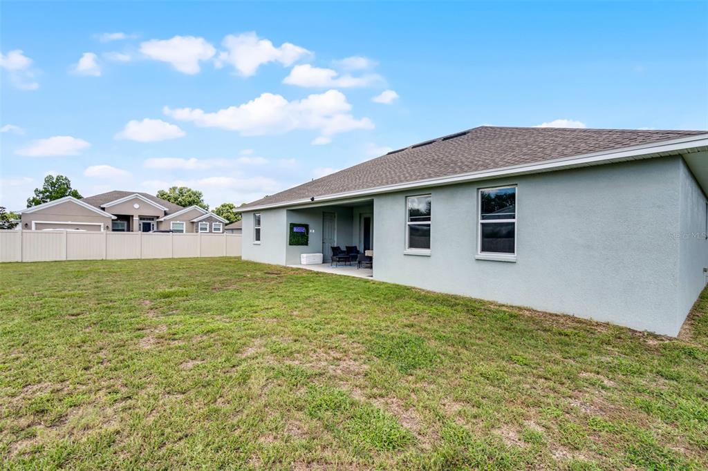 804 Channing Street Winter Haven, FL 33880 - Photo 31 of 31 a house view with a garden space