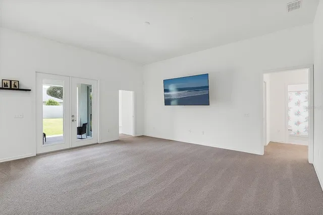 an empty room with windows