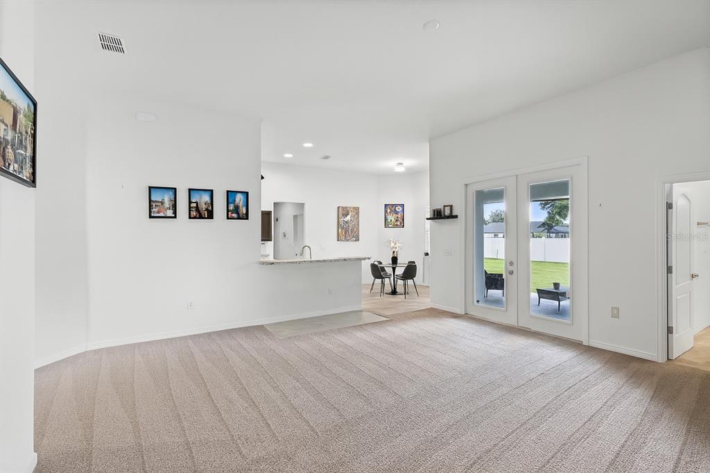 804 Channing Street Winter Haven, FL 33880 - Photo 8 of 31 a view of an empty room with a window