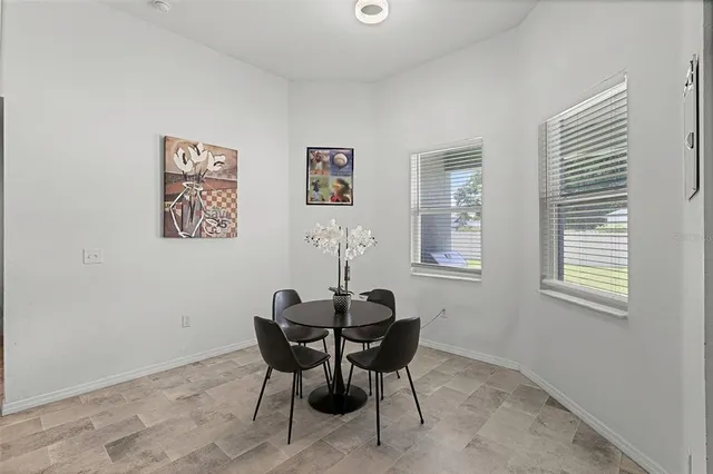 a dining room with table and chair