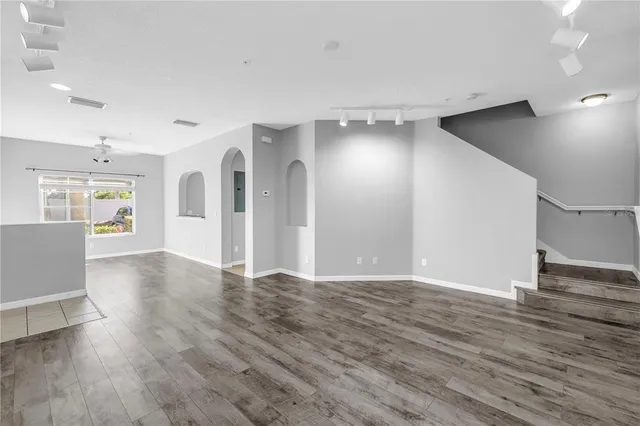a view of a livingroom with wooden floor