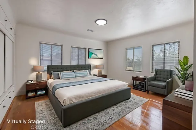 a bathroom with a toilet sink and shower