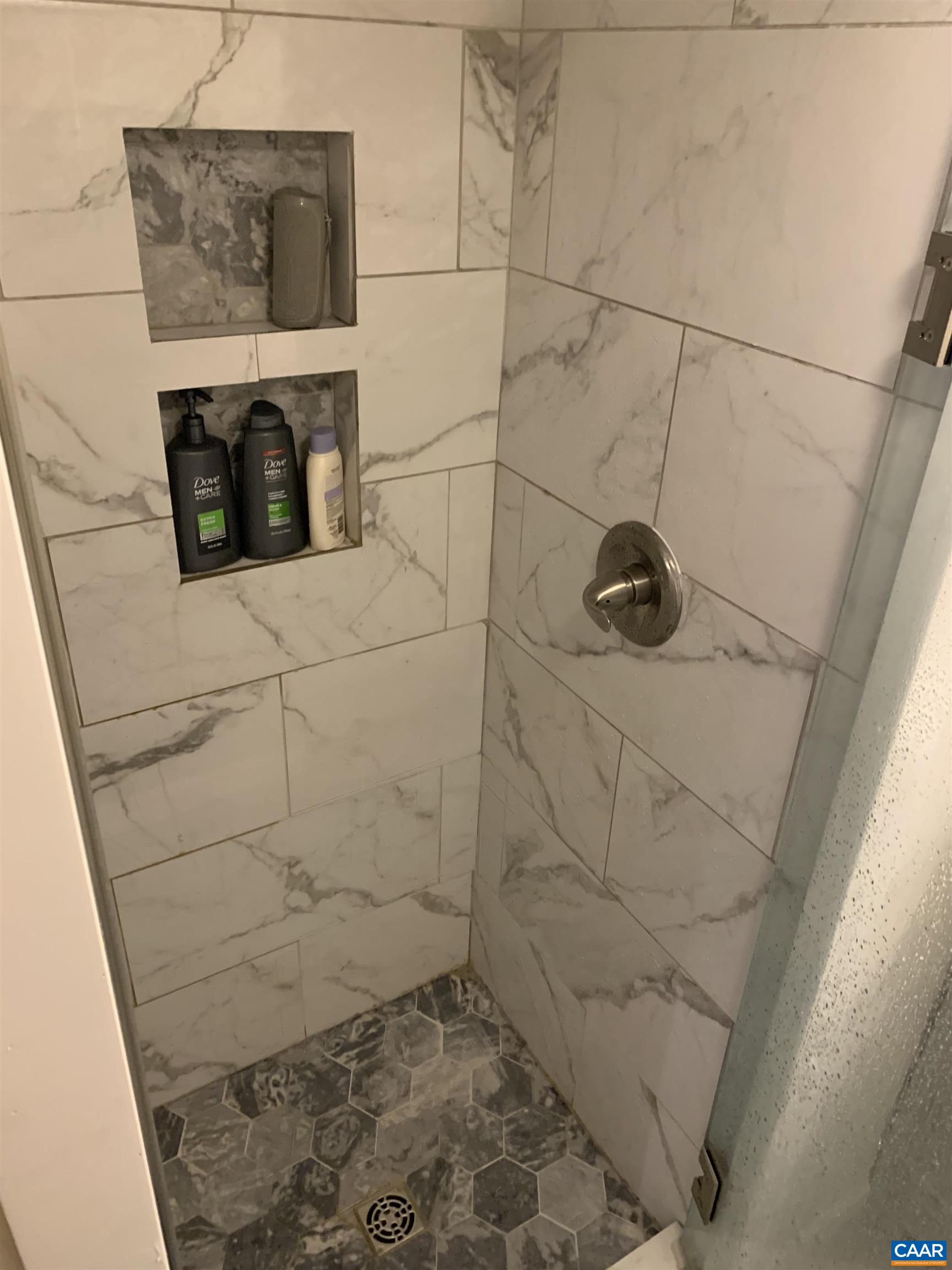 1407 Grady Avenue, Unit D Charlottesville, VA 22903 - Photo 11 of 14 a bathroom with a shower