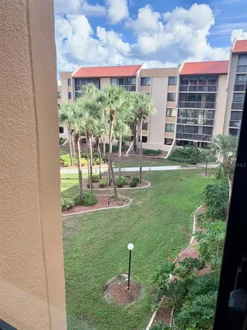 a view of a back yard of the house