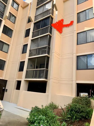 a view of building with large windows