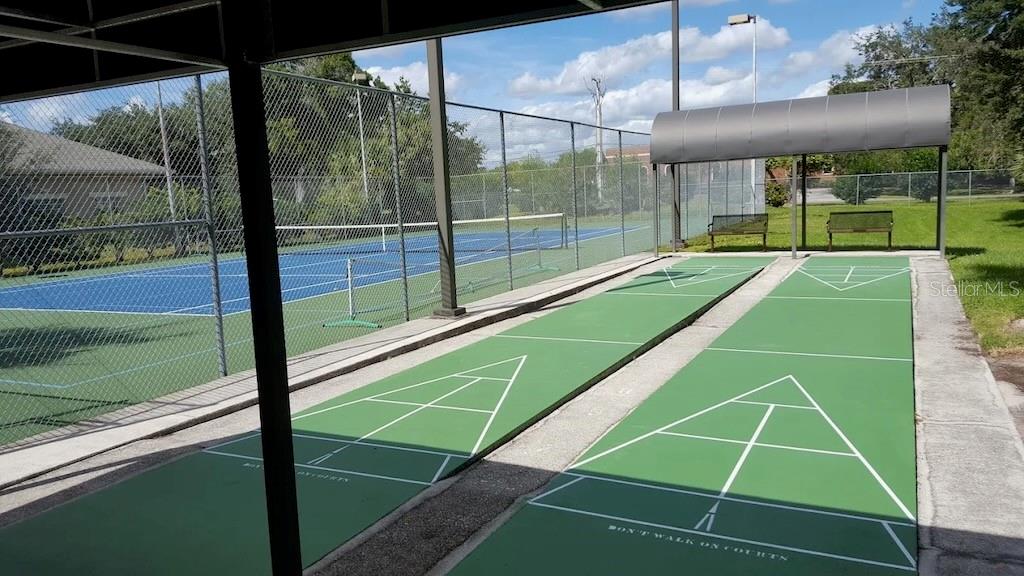 3006 Caring Way, Unit 417 Port Charlotte, FL 33952 - Photo 23 of 24 a view of a tennis court