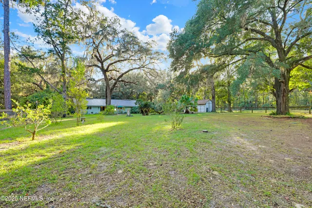 a view of living room with furniture and flat screen tv