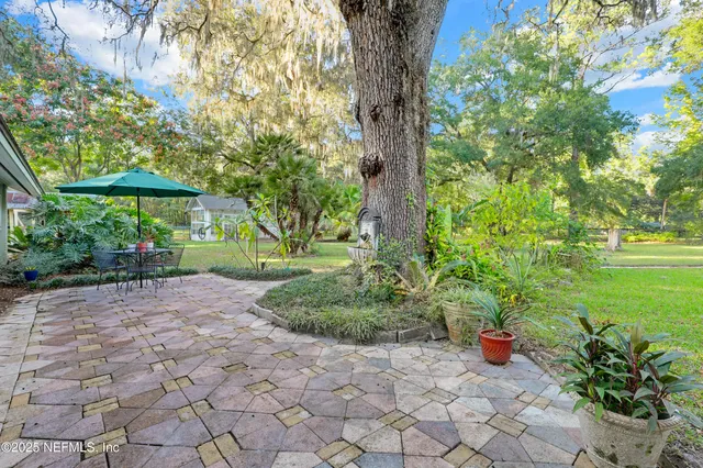 a bathroom with a shower and toilet