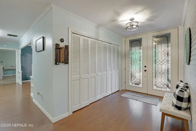 a kitchen with a sink stove and refrigerator
