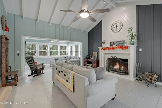 a view of a yard with large trees