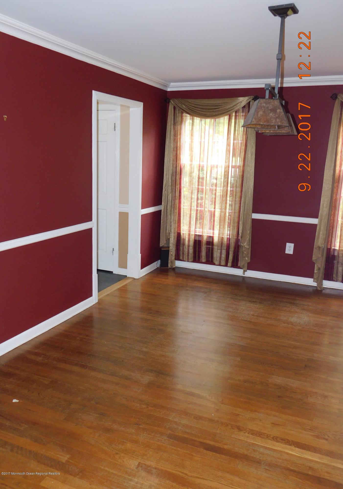 68 Stavola Road Middletown, NJ 07748 - Photo 11 of 49 a view of a livingroom with wooden floor