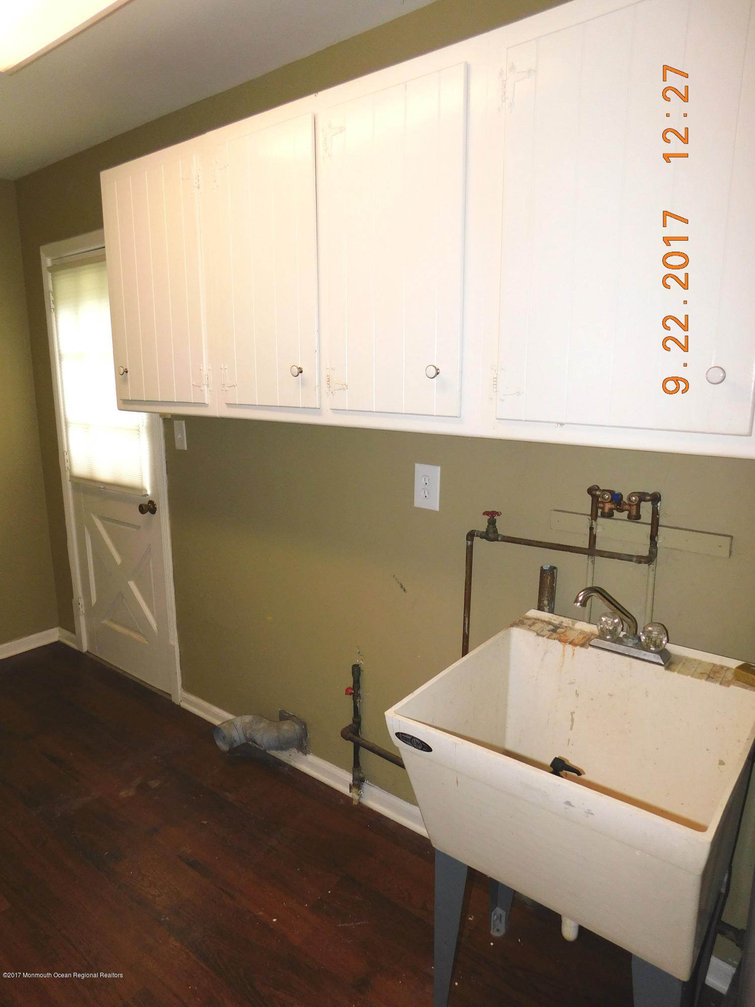 68 Stavola Road Middletown, NJ 07748 - Photo 36 of 49 a bathroom with a sink and a window